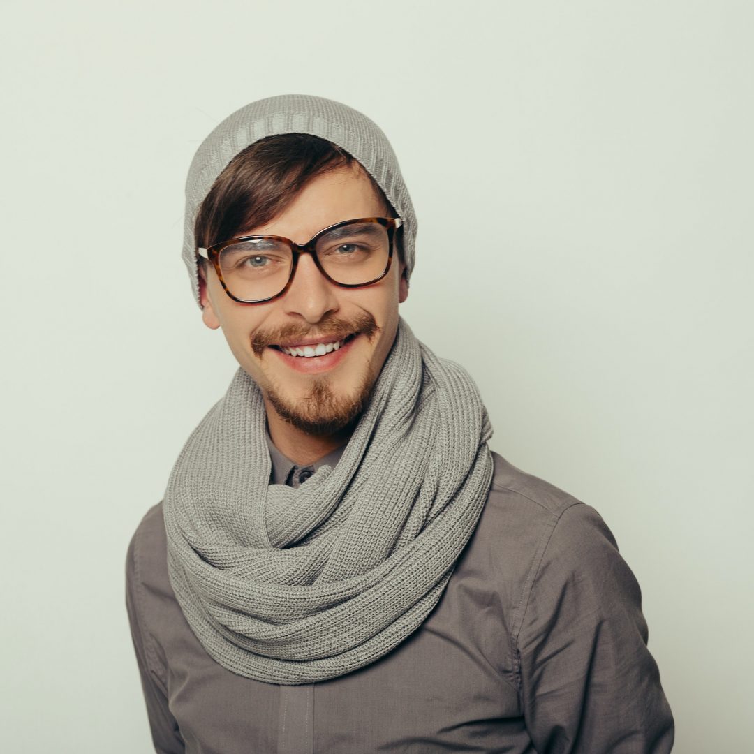 portrait of an interesting young man in winter clothes jpg